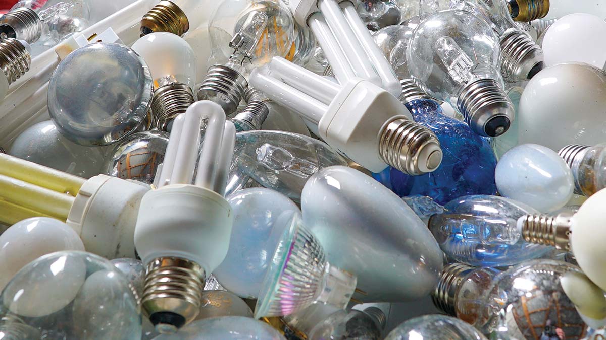 Pile of wide variety of light bulbs